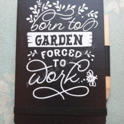 Born to garden, forced to work small notebook with pencil